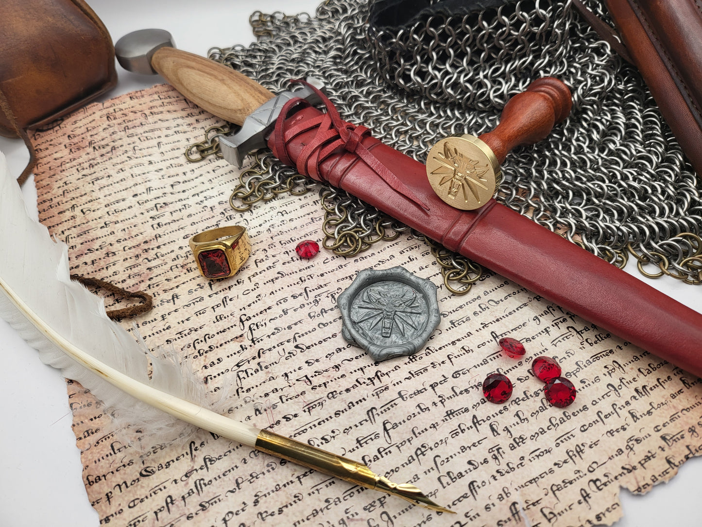 Close-up of Witcher Wolf wax seal stamp showing the engraved wolf emblem.