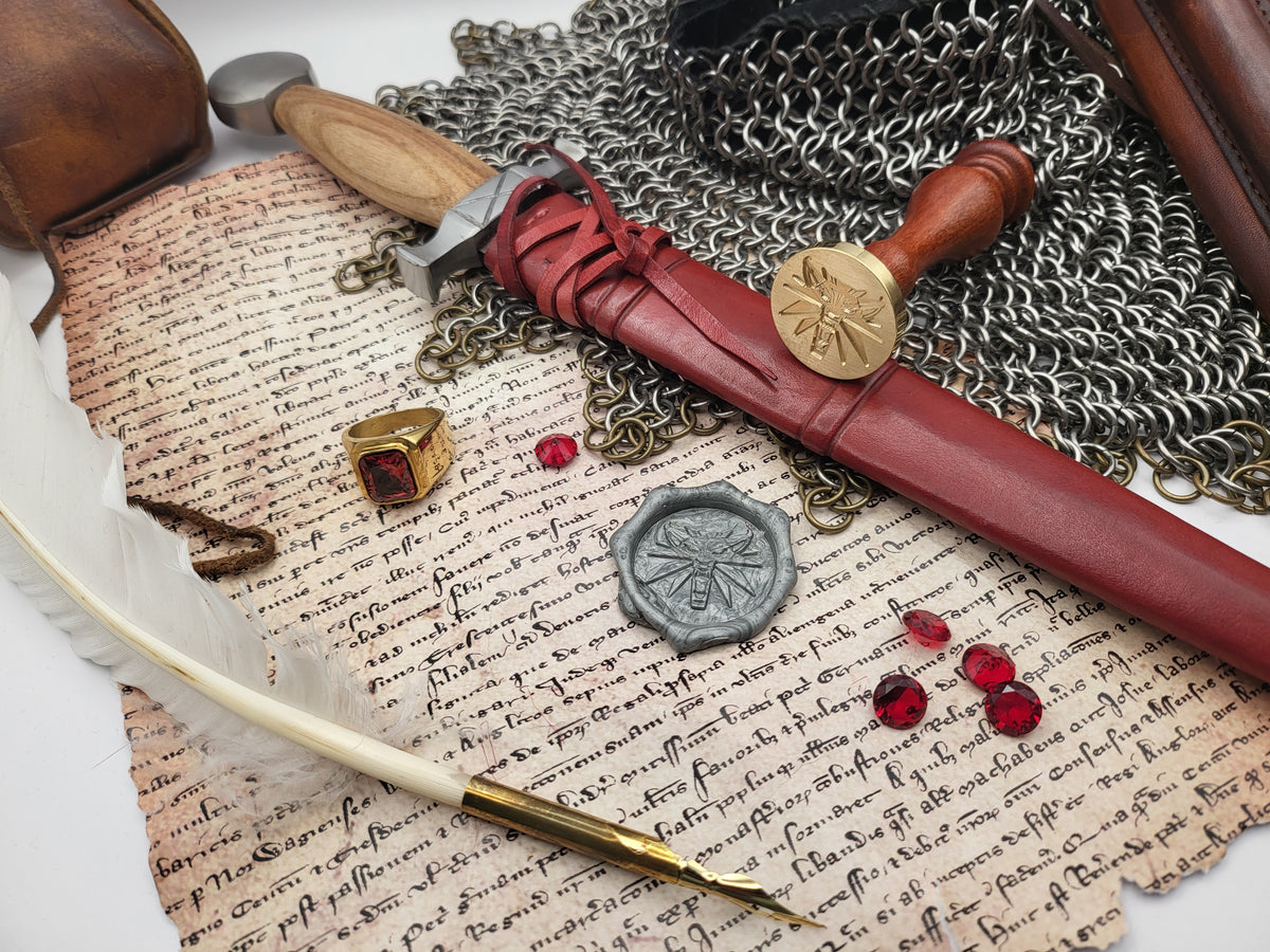 Close-up of Witcher Wolf wax seal stamp showing the engraved wolf emblem.