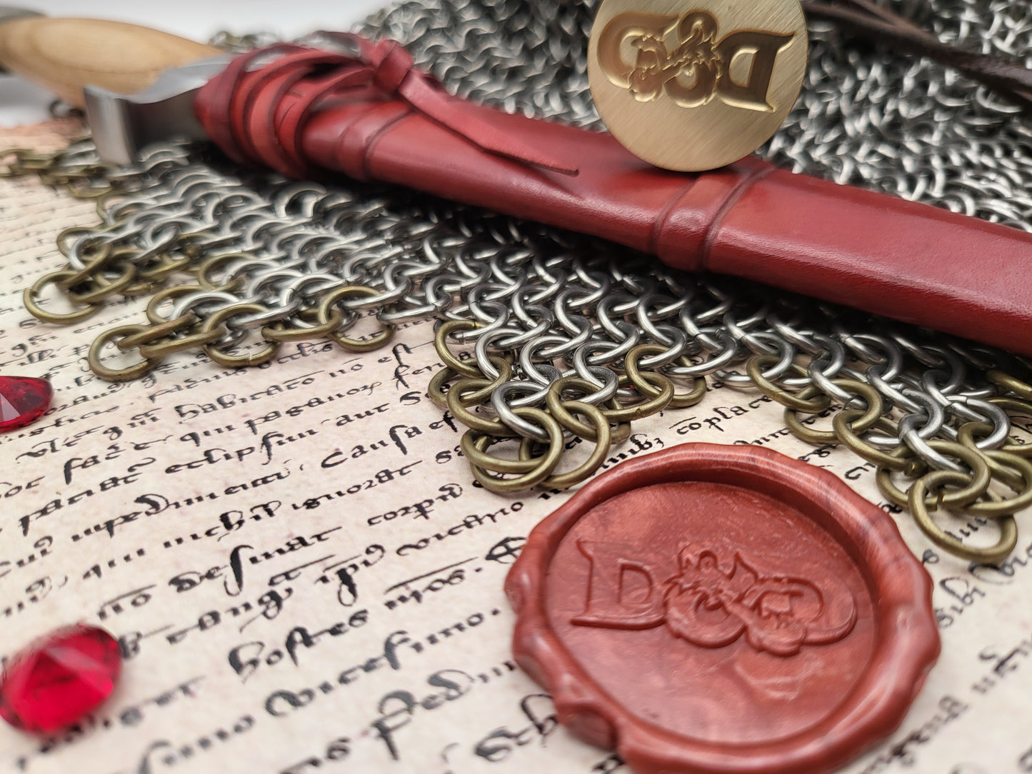 Close-up of D&D dragon ampersand wax seal stamp showing the engraved brass design.