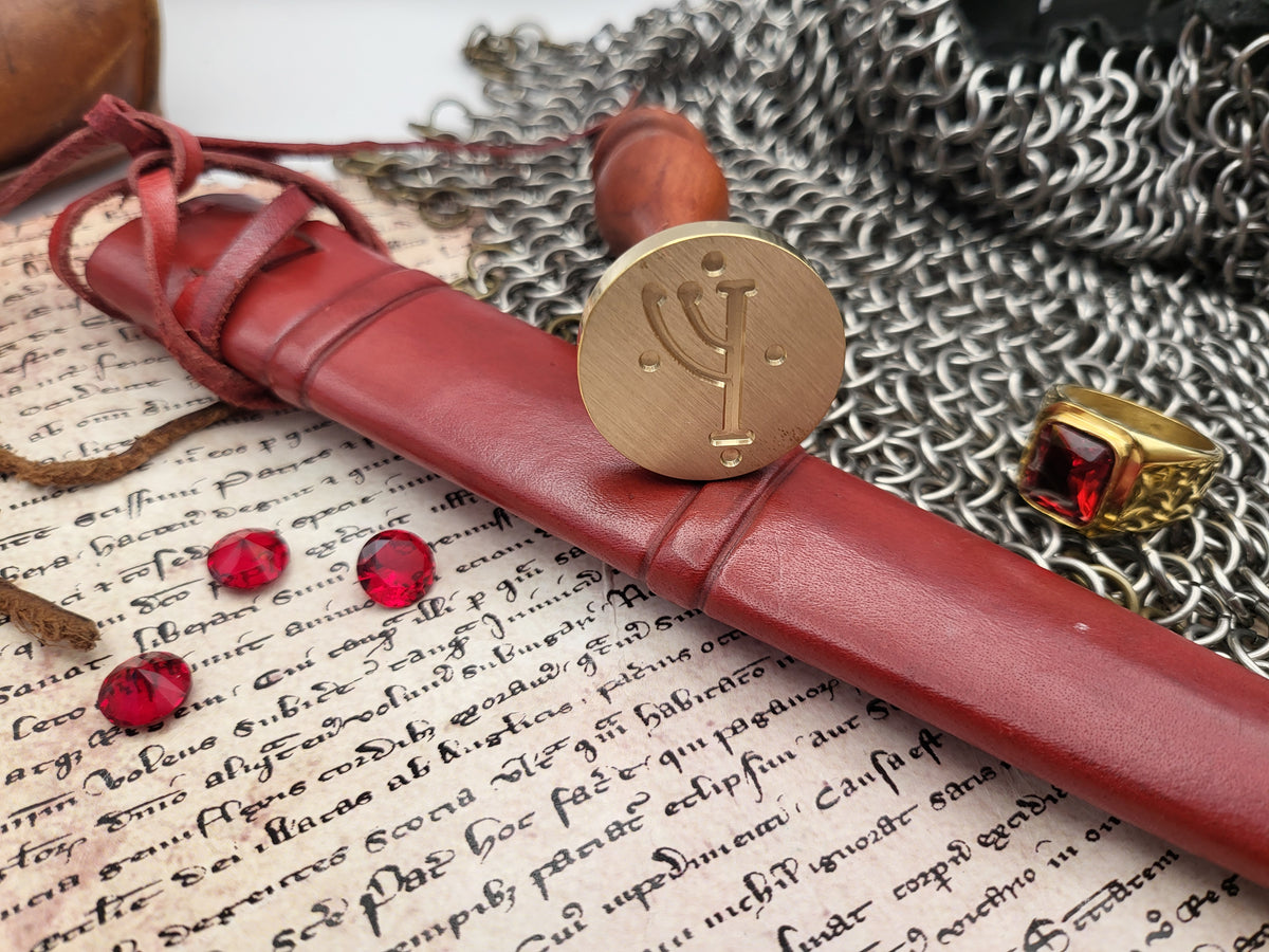 Gandalf rune wax seal impression applied to an envelope with sealing wax.